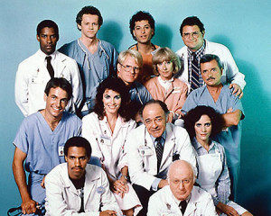 Lloyd (bottom right) on the set of "St. Elsewhere" with notable co-stars Denzel Washington, Mark Harmon, Ed Begley and others.