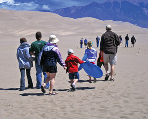 Visitors to Great Sand Dunes National Park, Colorado, bring boogie boards to sand-surf the dunes.