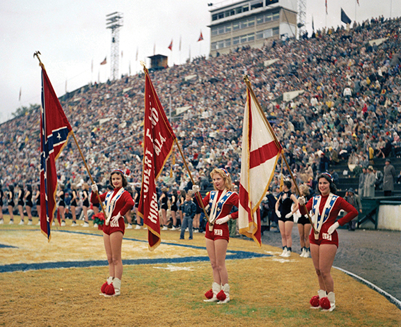 1958. Marching band color guard during halftime at the Blue-Gray game, Cramton Bowl. Montgomery, AL. (Horace Perry photo)