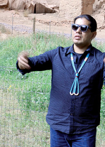 Our Navajo guide explains the meaning of turquoise and the symbolism of his necklace. 