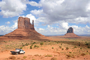 The Mittens, so called because they resemble the mitten-clad hands of a giant, are two of the most distinctive buttes in Monument Valley.