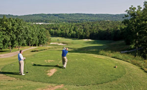 Sculpted from the peaks and valleys of the Appalachians, Oxmoor Valley offers scenic forests, numerous creeks and challenging elevation changes. The Ridge Course, with its rolling fairways, heavy tree cover and precipitous 150-foot elevation changes, is incredibly photogenic. As a reminder of the site's former use as mining land, the green at the par 5 twelfth is buttressed by a shelf of exposed shale rock. The Valley Course is dotted with picturesque lakes and stretches two miles downrange along a slender valley. The 18th hole, a 441 yard par 4, nicknamed "The Assassin," rises to a dramatic finish at the signature clubhouse just behind the green. The Short Course at Oxmoor Valley is a delightful collection of 18 pure one-shotters which offer sever elevation changes and almost every hole playing downhill. The Short Course is listed by Golf Digest's Places to Play as one of the nation's Great Value courses.
