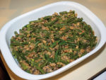 54907563 - green bean casserole is a casserole consisting of green beans, cream of mushroom soup, and french fried onions. it is a popular thanksgiving side dish in the united states.